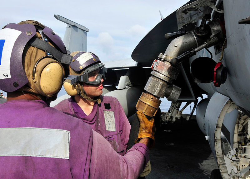 Illustration for article titled Here Is What All Those Colored Shirts Mean On An Aircraft Carrier's Deck